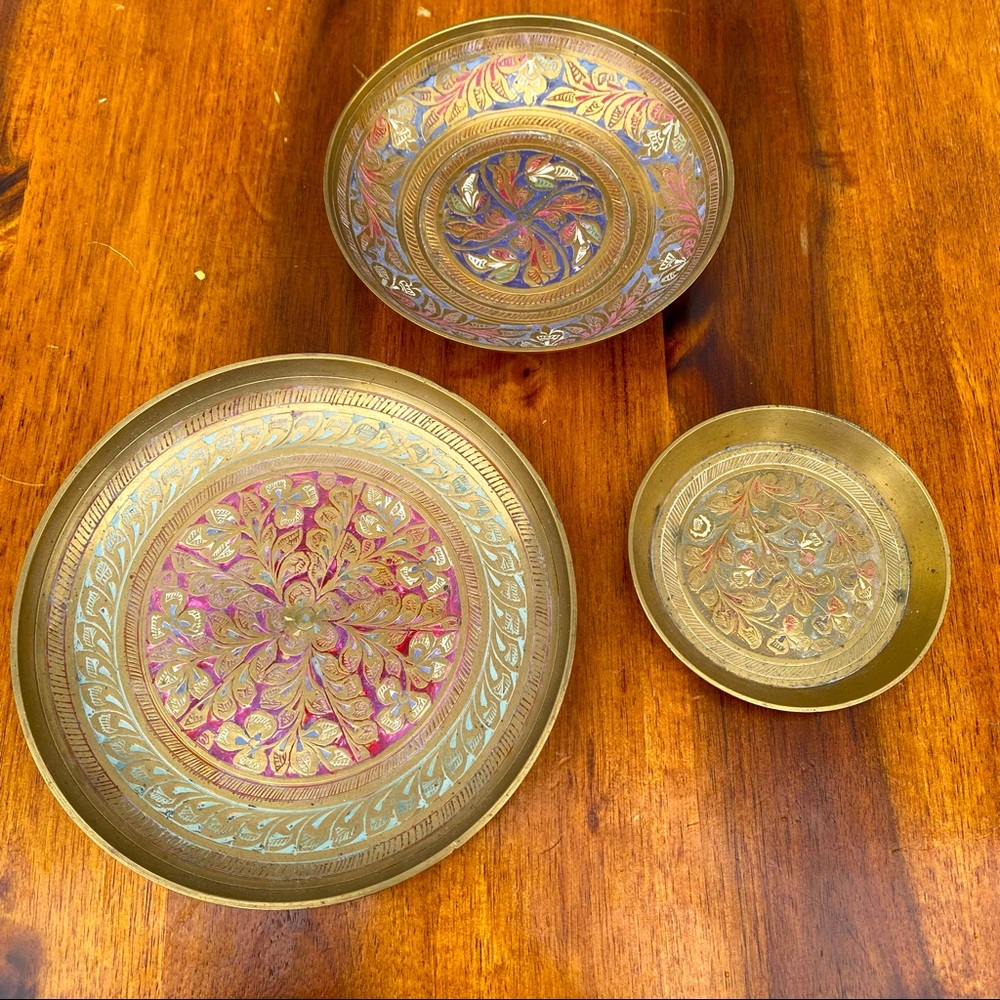 Set of three small brass trinket dishes from India